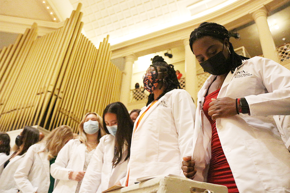 BSN Class of 2024 students received a white coat - which marks the advent of clinical rotations and students' caring for human rather than simulated patients - at the 2021 White Coat Ceremony in Old Cabell Hall.