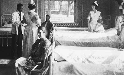 Nursing students wearing the new, shorter blue uniform, circa 1921. Courtesy of Historical Collections & Services, Claude Moore Health Sciences Library, University of Virginia.