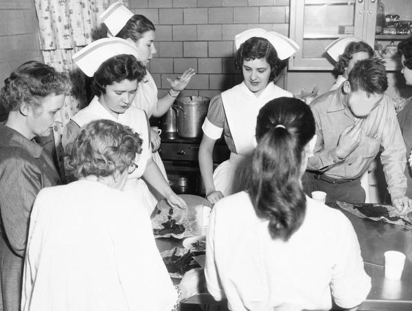 Dean Tyson and nursing students socialize with psychiatric patients as part of the students' psychiatric nursing training.	Eleanor Crowder Bjoring Center for Nursing Historical Inquiry, University of Virginia School of Nursing. Ralph Thompson, Photographer.