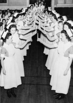 Banding, an important rite of passage for second-year students, was celebrated with a candlelit procession and ceremony.	Ruth Repass Shaver Collection.   Eleanor Crowder Bjoring Center for Nursing Historical Inquiry, University of Virginia School of Nursing.
	