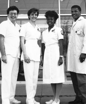 By the 1980s nursing students no longer wore standardized uniforms, but were identified by orange and blue arm patches.	Eleanor Crowder Bjoring Center for Nursing Historical Inquiry, University of Virginia School of Nursing. Ralph Thompson, Photographer.
