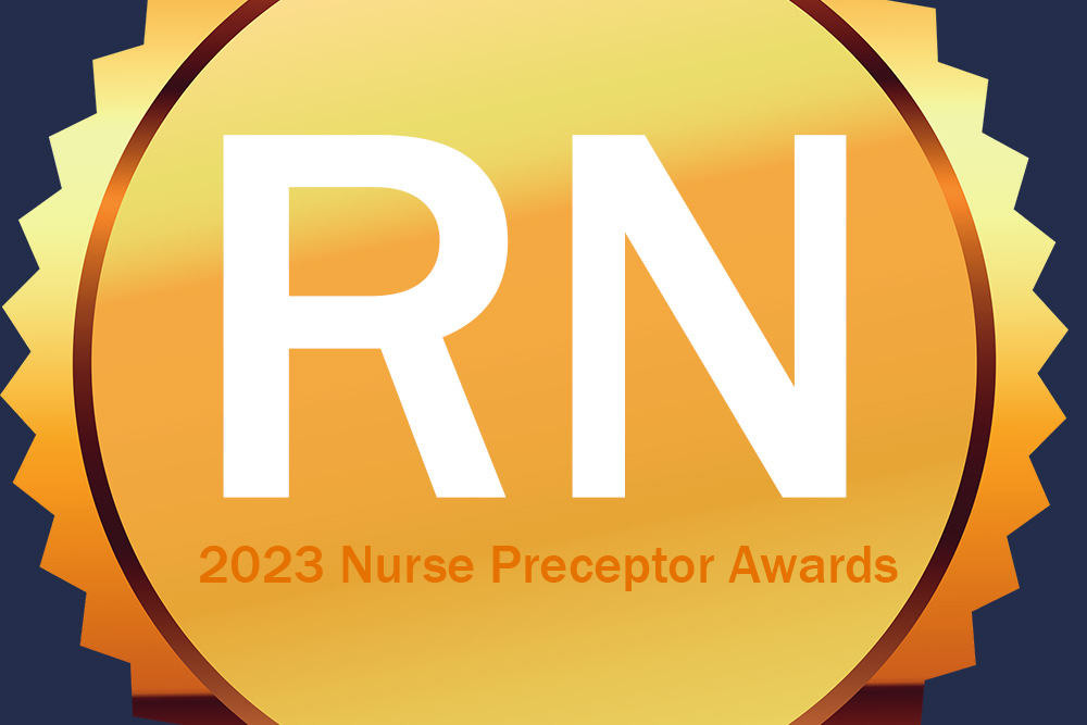 A gold badge with RN at the center to celebrate the School's preceptor-mentors who nurture BSN and APRN nursing students.