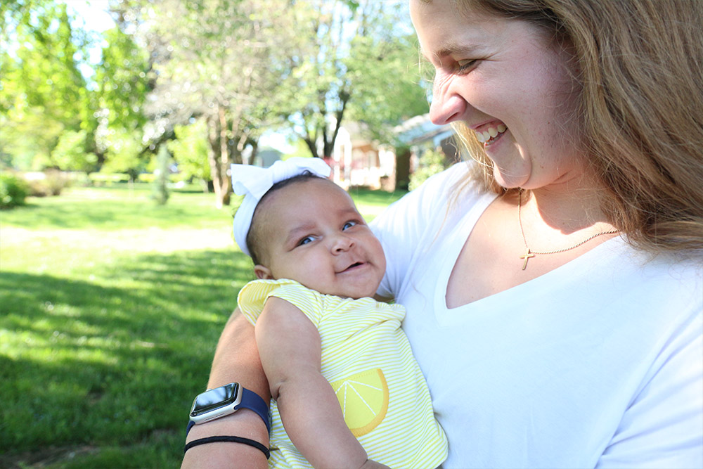Baby Brielle smiles at third-year Madi Wilson