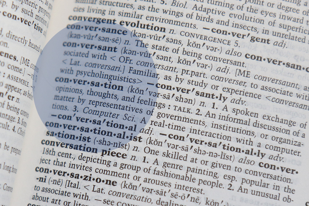 A dictionary page with the definition of conversation highlighted.