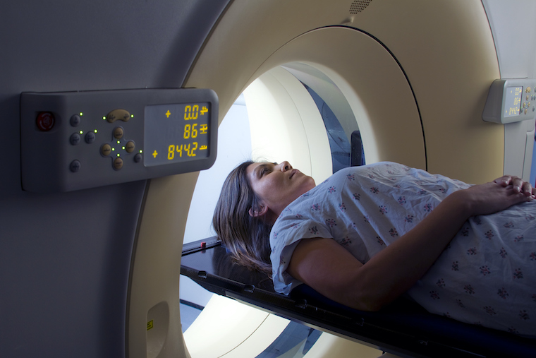 A woman getting an MRI