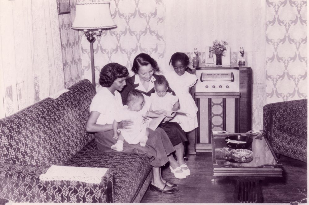 Public health nurse Imogene Bunn in home of a family in the 1950s