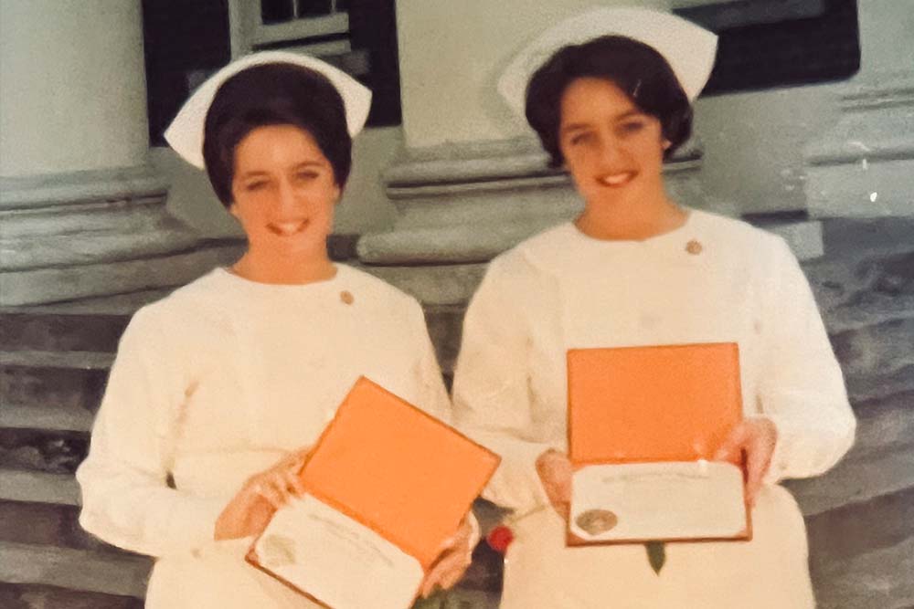 Joyce Fisher Laux and Janet Fisher Sleppy at 1966 graduation