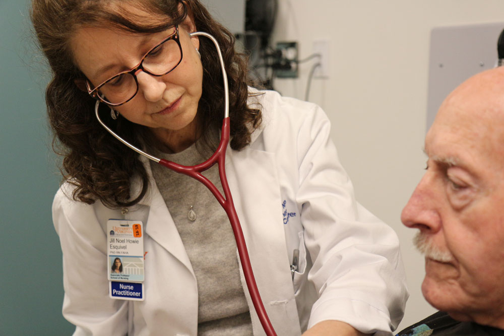 UVA Nursing Professor Jill Howie-Esquivel examines a heart failure patient