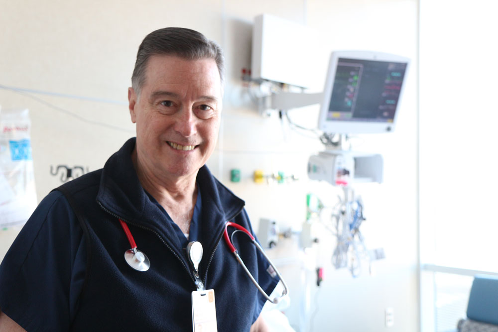 A photo of Paul Merrel, a critical care nurse and graduate of UVA School of Nursing,