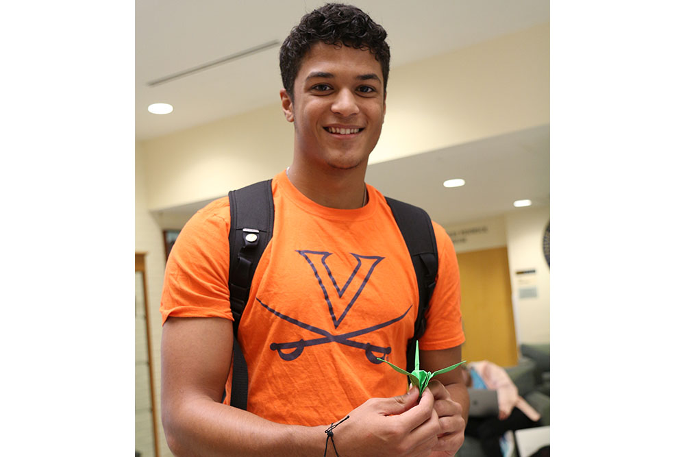 An image of nursing student Jayden Williams, who stated his intentions and folded a crane as part of the HoosInclusive campaign in 2019.