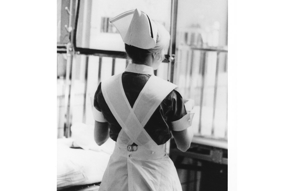 A UVA nurse from 1971 with bandage scissors tucked in her apron.