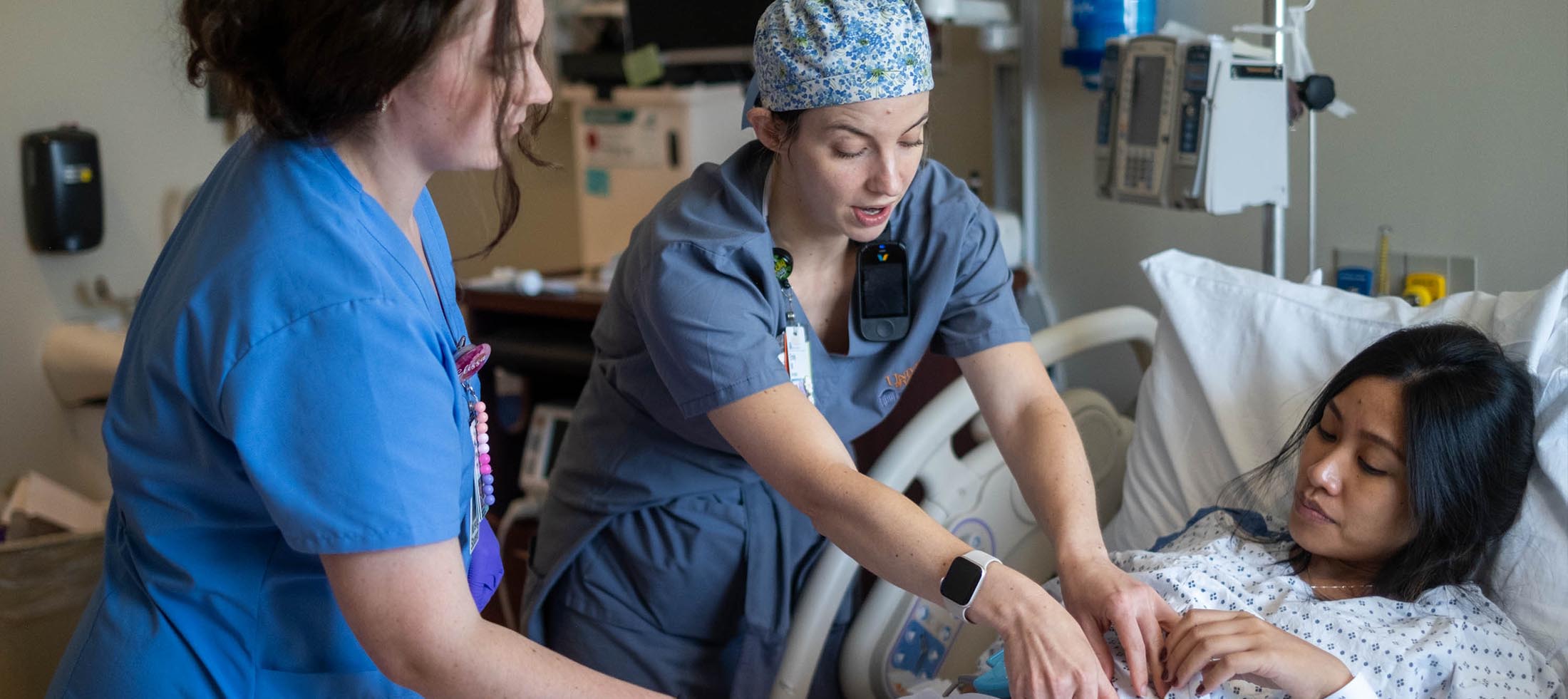 A UVA Health preceptor in labor and delivery teaches a nursing student.