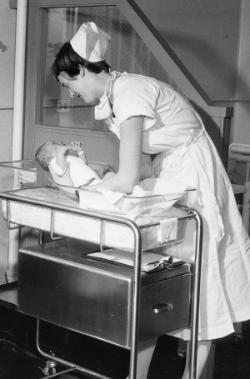 Newborn care in the hospital nursery, 1959.	Eleanor Crowder Bjoring Center for Nursing Historical Inquiry, University of Virginia School of Nursing. Ralph Thompson, Photographer.